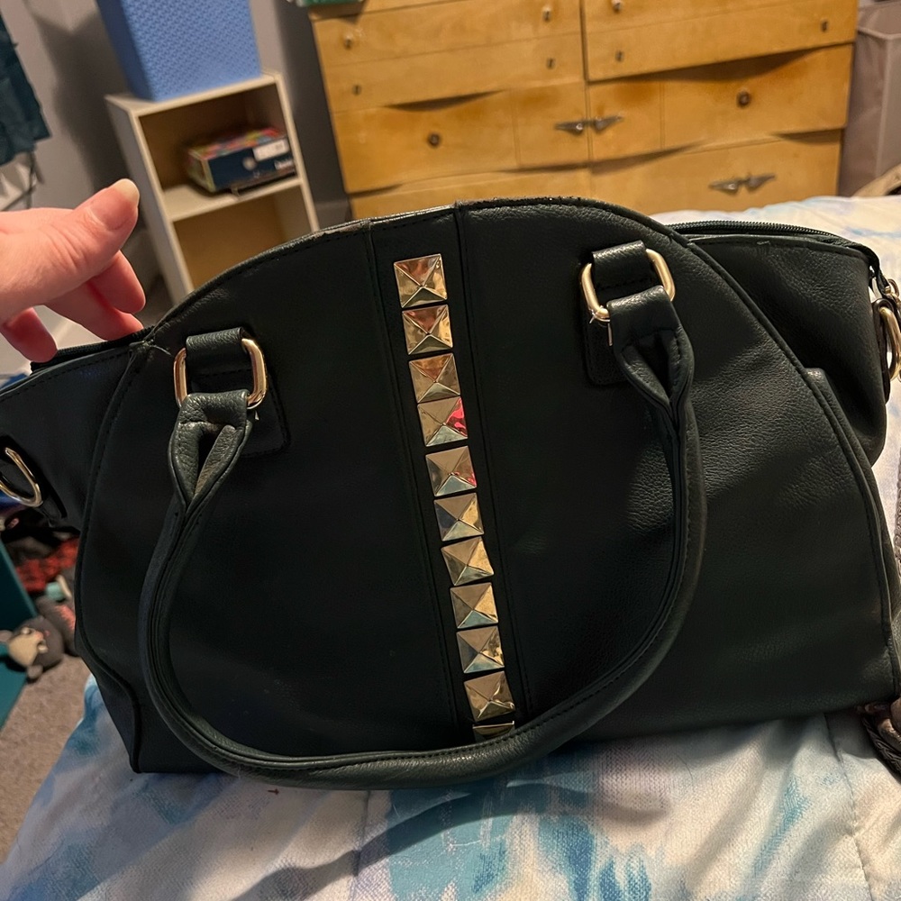 Dark green and gold purse